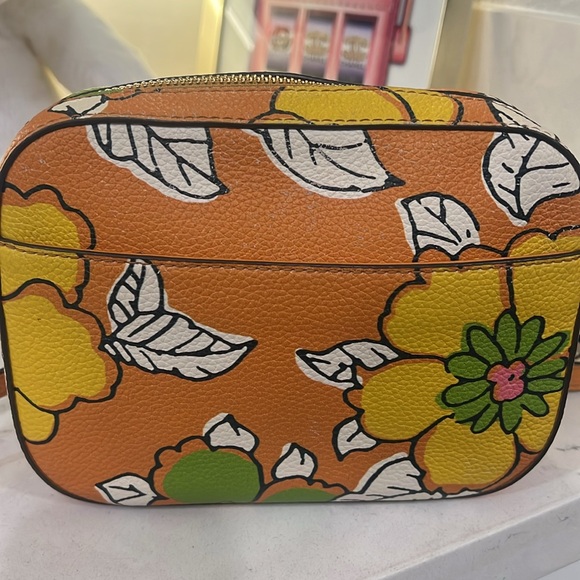 Tory Burch camera bag crafted of leather with floral motif. - Picture 10 of 17